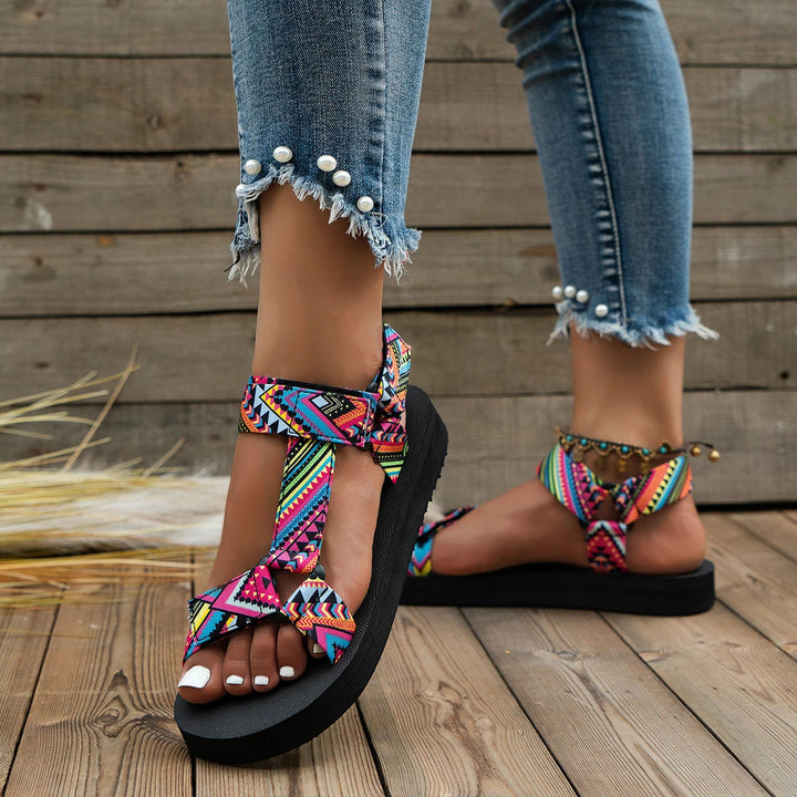 Casual women's summer sandals with a vibrant colorful design. Lightweight & comfortable for beach or vacation.