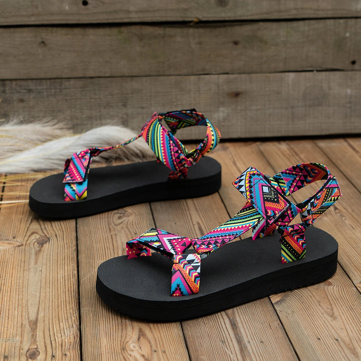 Vibrant women's summer sandals with a colorful design. Lightweight, comfortable open-toe, perfect for vacation.
