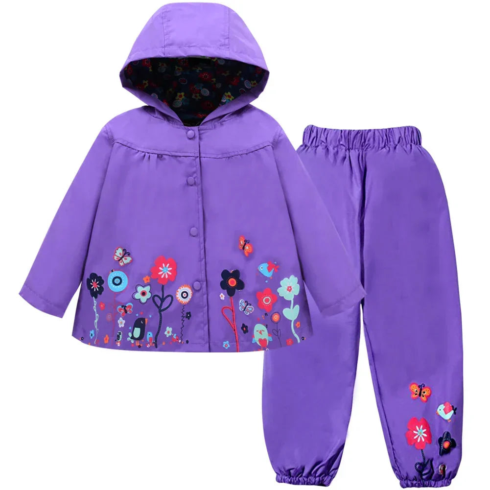 Durable Liora children's waterproof rain gear set, featuring a hooded jacket & elasticated trousers.