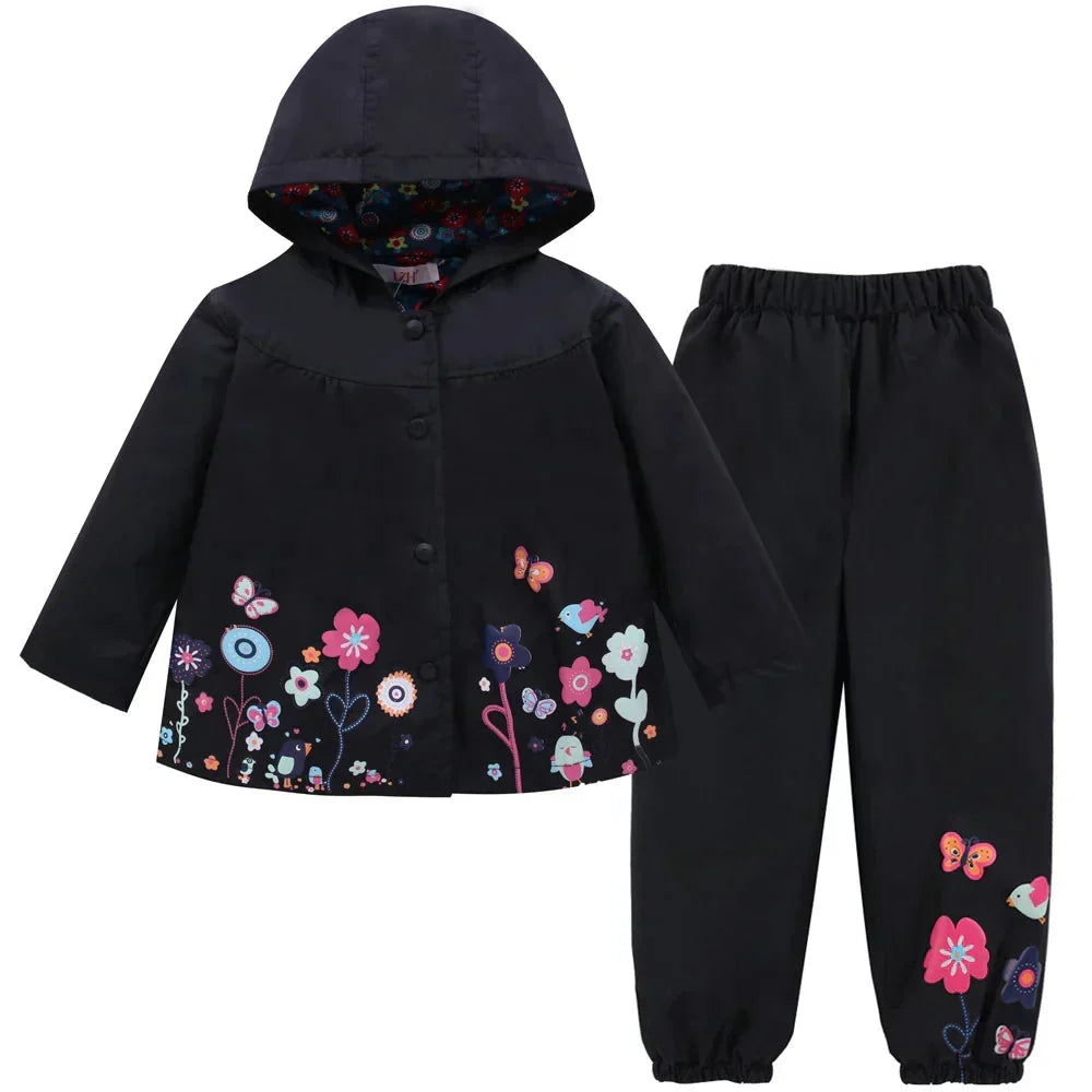 Protective Liora kids rain suit: a waterproof & windproof hooded jacket paired with durable rain pants.