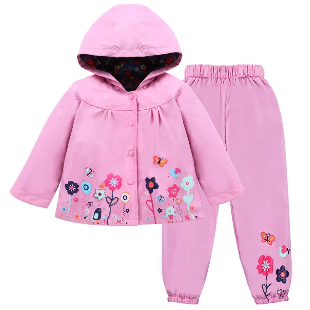 Children's Liora waterproof rain jacket & trousers set, designed for comfortable, dry outdoor adventures.