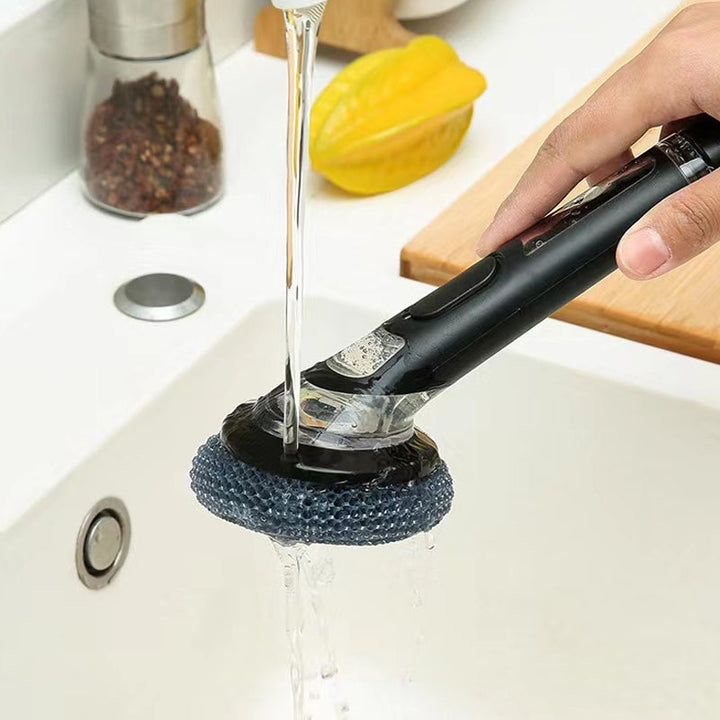 Dish washing brush with soap dispensing handle, perfect for pots, pans, and everyday kitchen utensils.