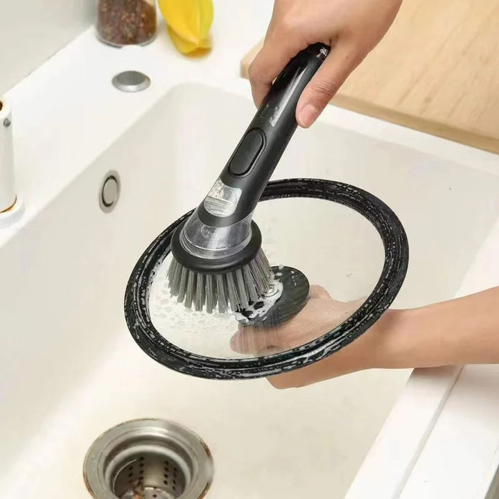 Dish cleaning brush with dispenser, designed for comfortable grip during extended cleaning sessions.