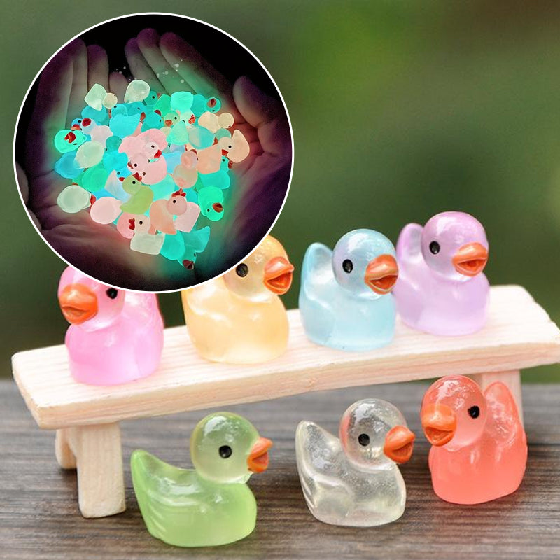 Luminous mini duck figurine for garden decor, glowing in the dark, perfect for crafting projects.