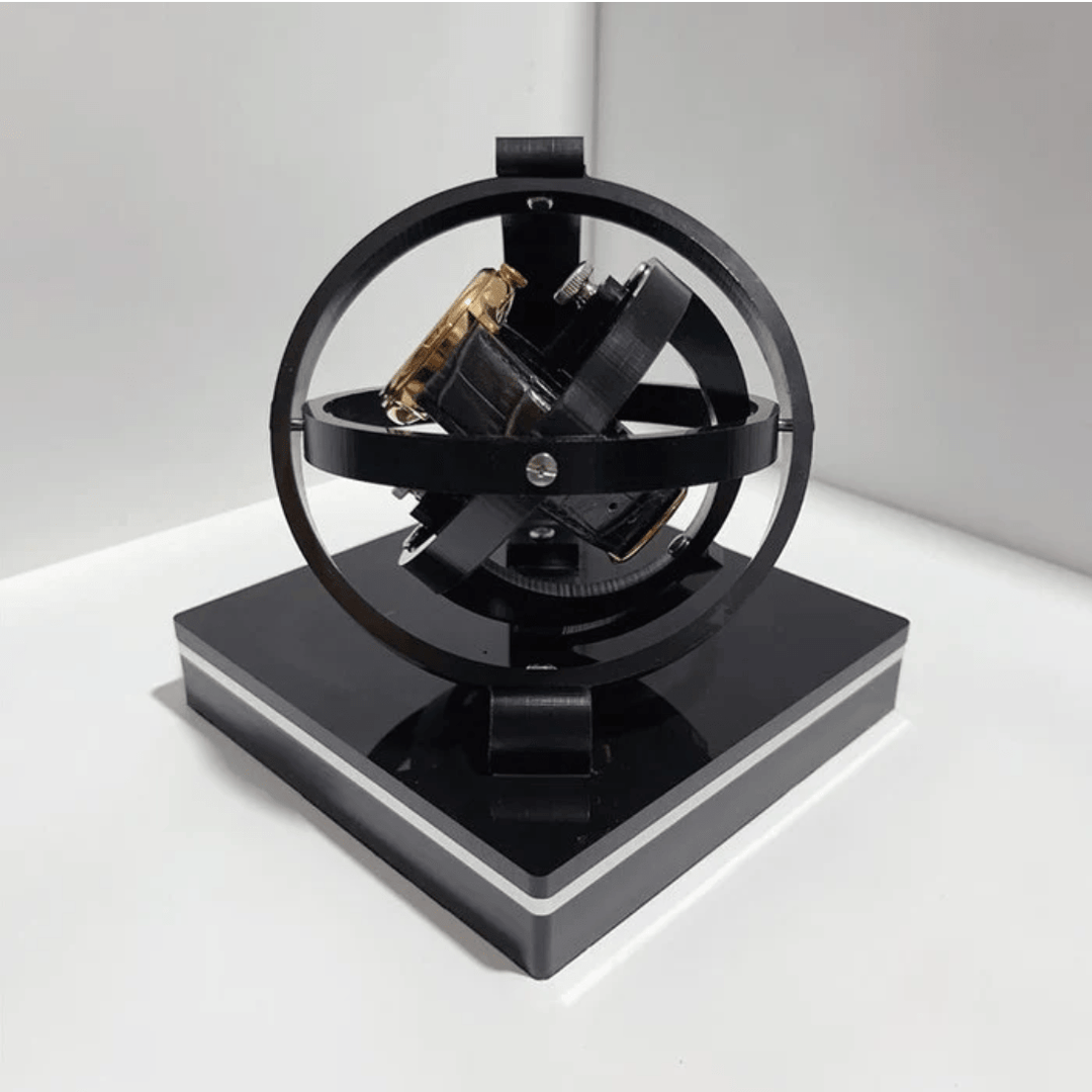 Sleek automatic watch winder with silent motor and luxury display case, essential watch accessory.