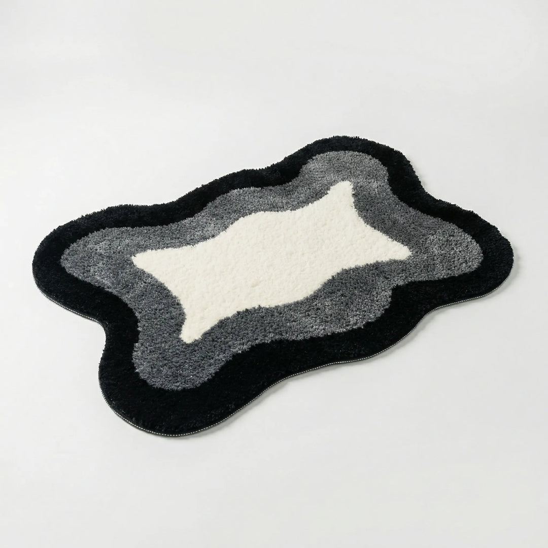 Full view of the Flowique wave luxury bath rug. Plush, absorbent, & non-slip design, ideal for any modern bathroom or entryway.
