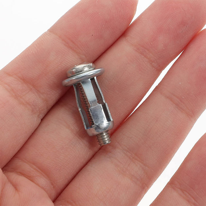 Detail view of the threads on an expansion screw petal nut, highlighting its robust construction.