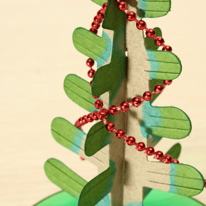 Children excitedly watching their Magic Growing Crystal Tree develop, educational science kit