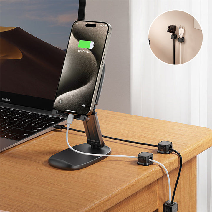 Magnetic cable organizer clip holding earbud wires, preventing tangles in a travel bag or car