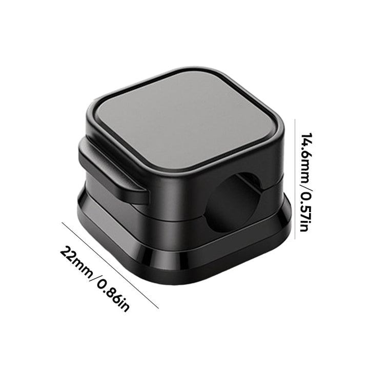 White magnetic cord organizer clip keeping a lamp power cable tidy on a nightstand or desk