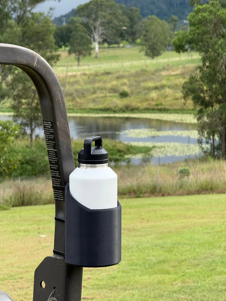 Magnetic tool organizer & drink holder for workshops. Heavy-duty magnetic caddy keeps beverages secure on metal surfaces.