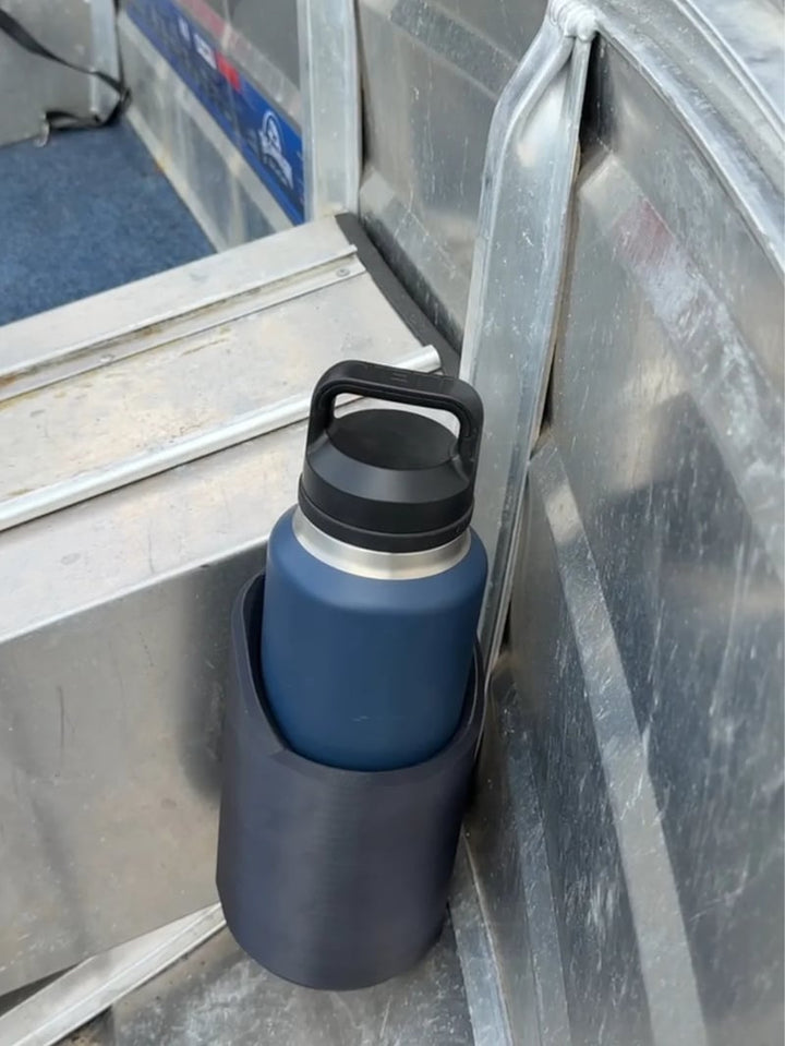 Magnetic bottle mount for gym equipment & workout spaces. Securely holds drinks, keeps hydration accessible during exercise.