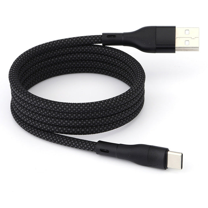 Magnetic cable, 1M, demonstrating its self-coiling feature thanks to integrated magnets