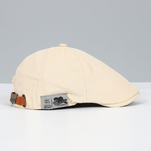 Modern gentleman's adjustable beret, a sleek fashion hat and casual accessory.