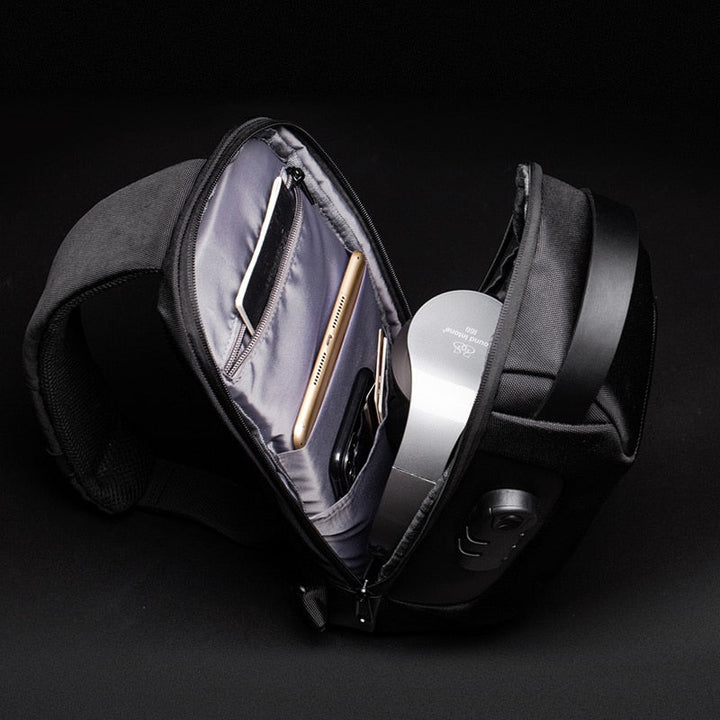 Versatile men's anti-theft sling. Water-resistant, USB charging, compact for daily essentials & travel.