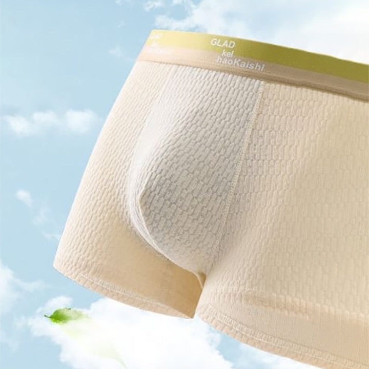 Stack of folded men's antibacterial breathable boxer briefs in various colors
