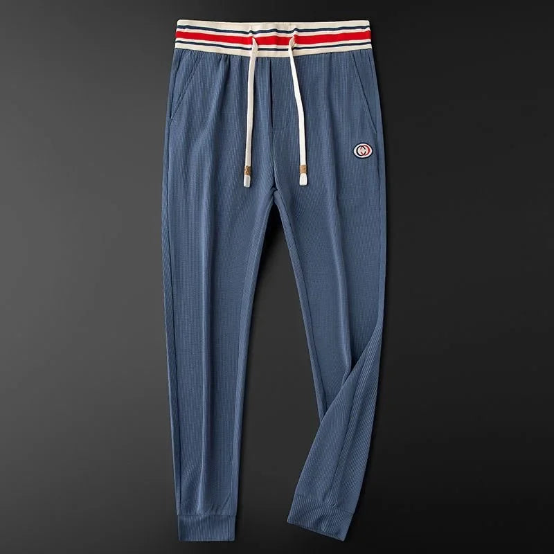 Versatile men's joggers, great for sports or casual outings. Easy care athletic pants with comfort.