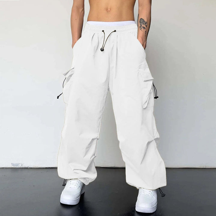 Men's baggy cargo parachute pants for streetwear, featuring loose fit, multi-pockets, and Y2K hip hop style.