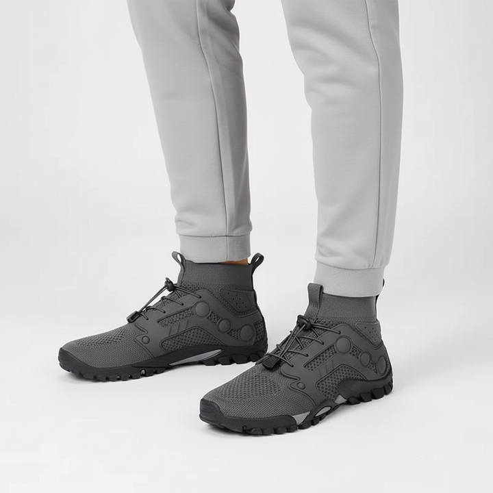 Modern men's high shaft barefoot hiking boots, durable & versatile for outdoor trails, promoting natural movement.
