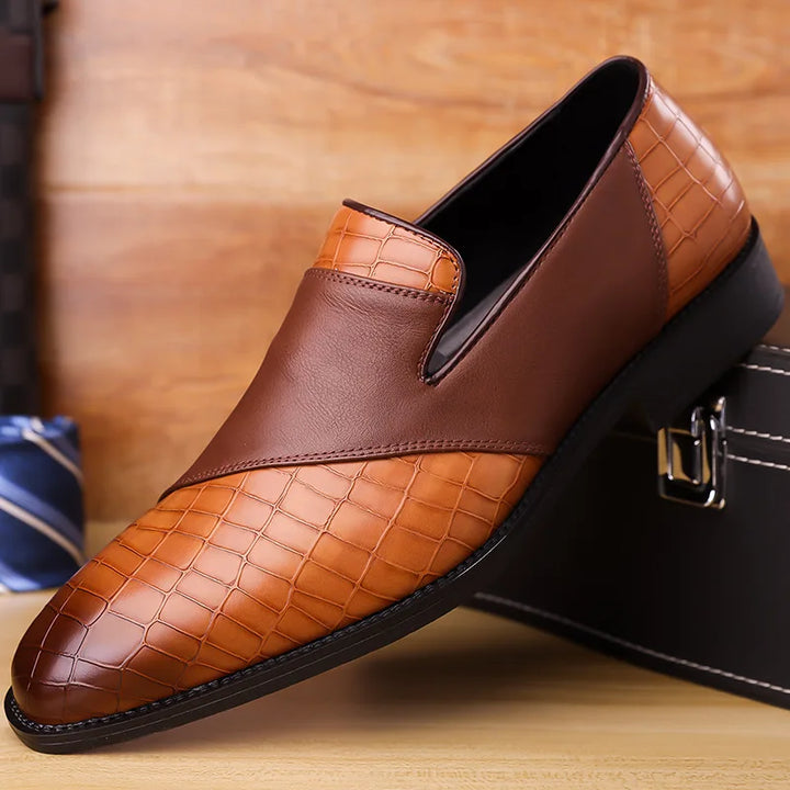 Men's black croc-embossed slip-on loafers, elegant & comfortable for business casual outfits.