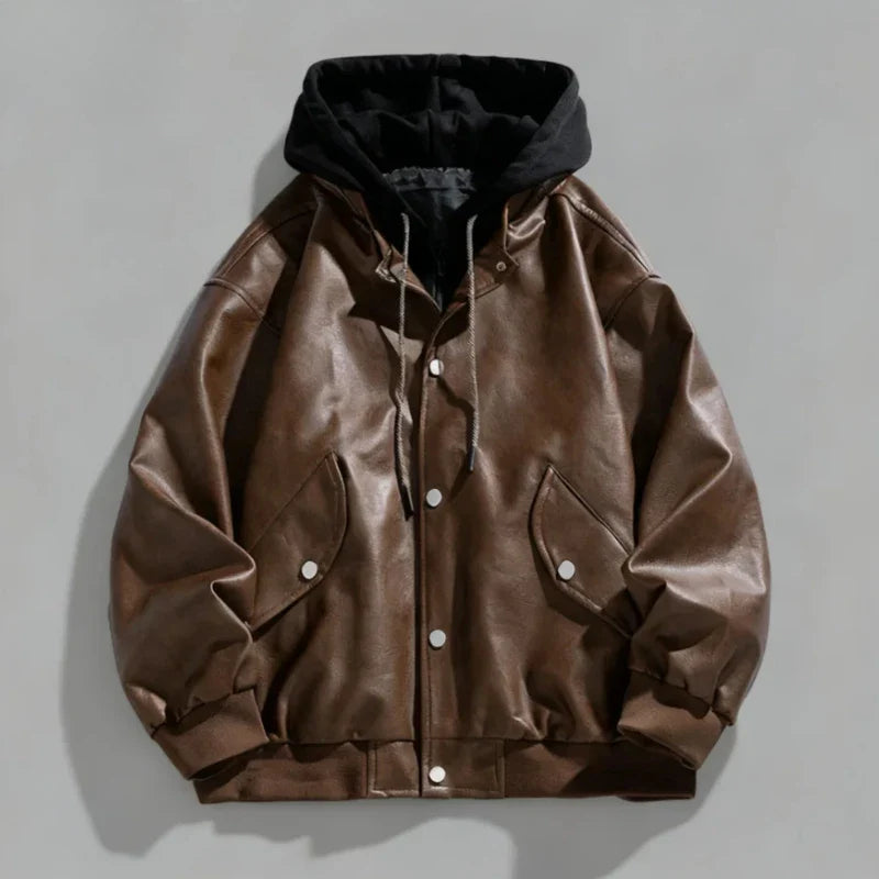 Detail shot of the hood and collar of a men's faux leather jacket with snap closure, black color
