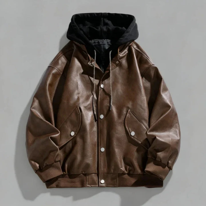 Detail shot of the hood and collar of a men's faux leather jacket with snap closure, black color