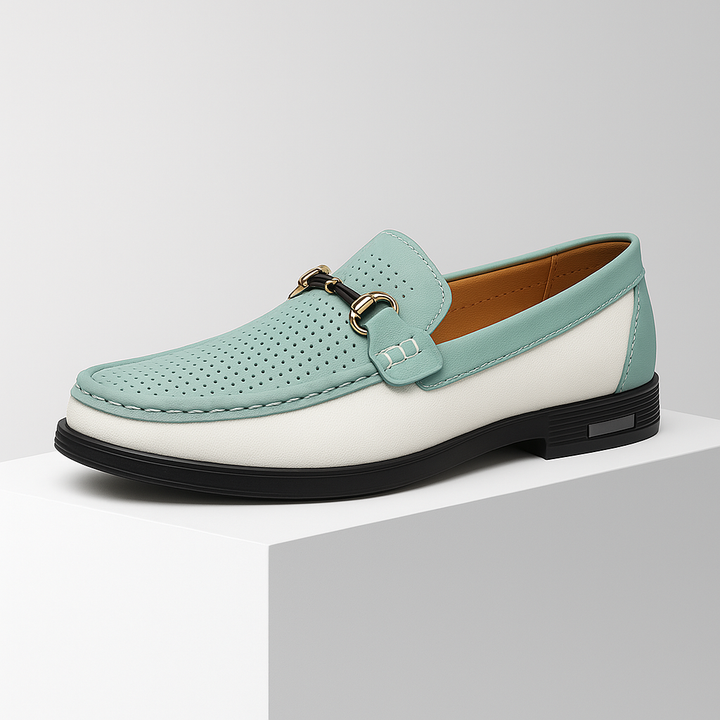 Detailed shot of the metallic bit on men's black leather slip-on loafers