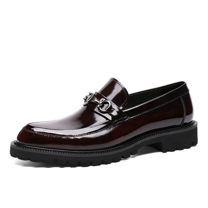 Elegant men's loafers with a durable polished leather finish, great for professional settings.