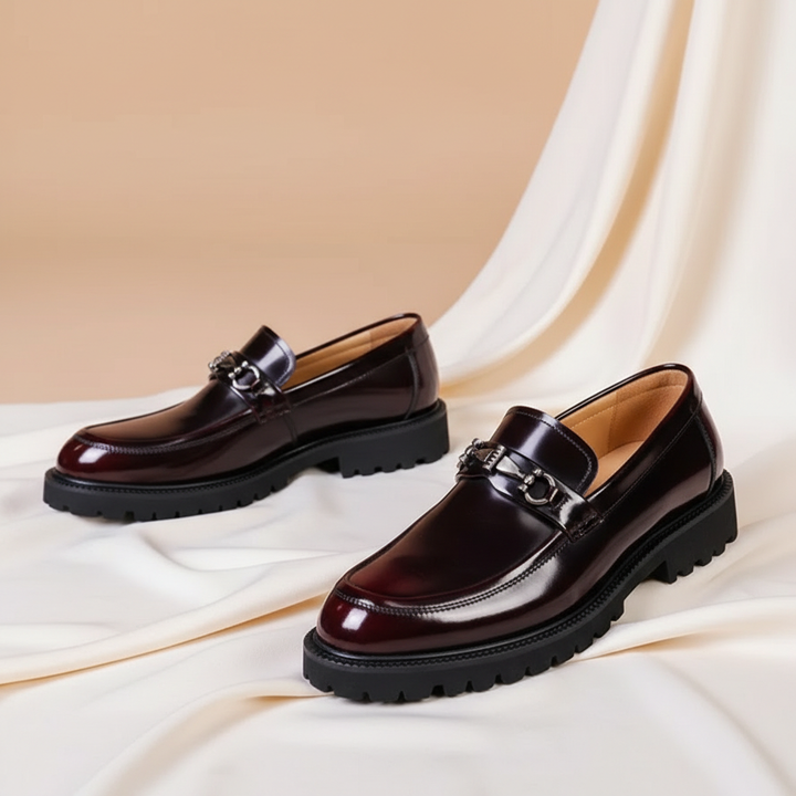 Classic brown polished leather loafers for men, offering timeless style and comfort.