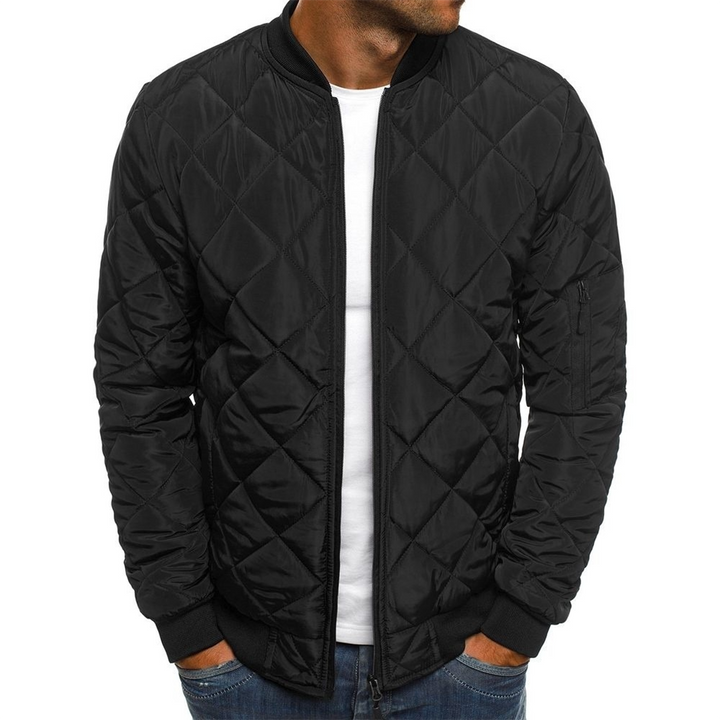 Lightweight urban style quilted jacket for men, ideal for cool weather and street fashion.