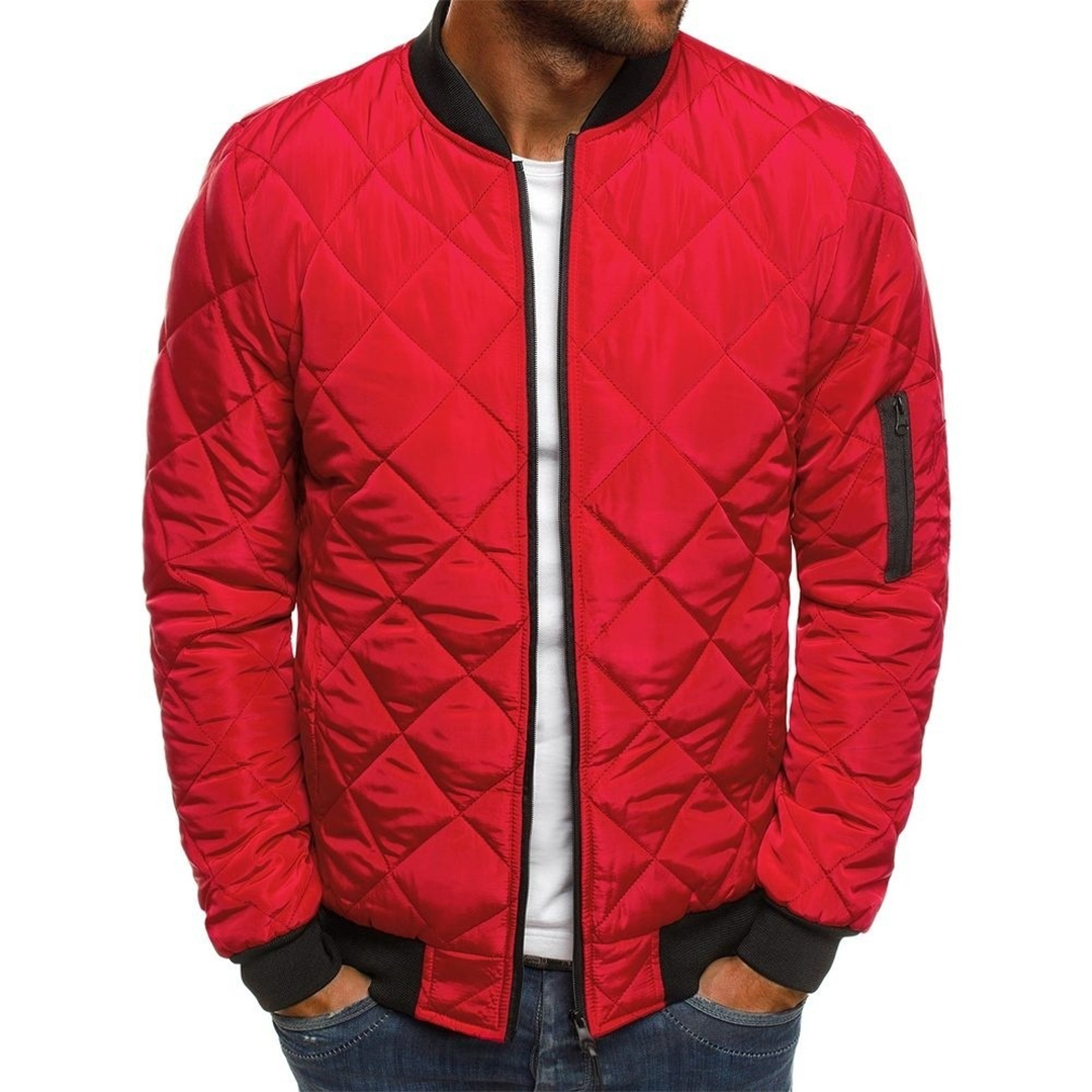 Close-up of the quilted texture on a men's stylish streetwear jacket, black color.
