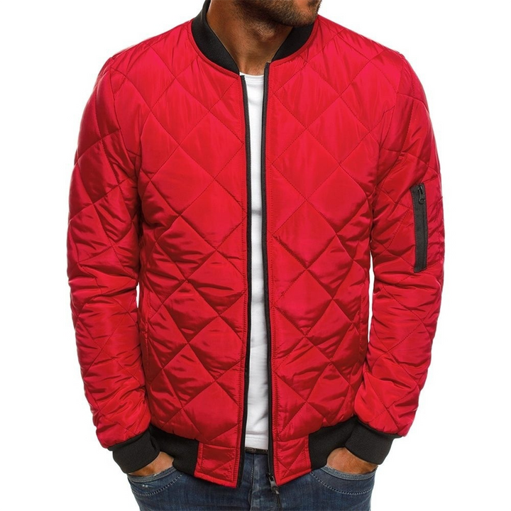 Close-up of the quilted texture on a men's stylish streetwear jacket, black color.
