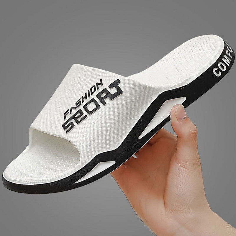 Close-up of the durable PVC material on men's sport slide sandals, pool shoes design