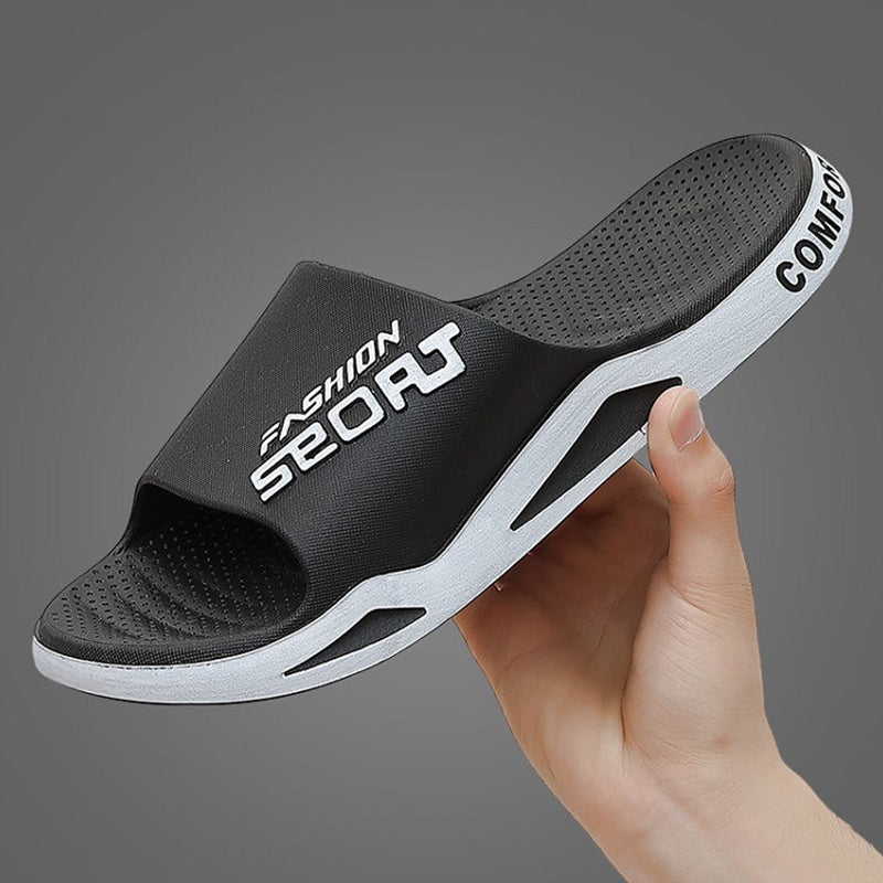 Men's sporty grey slide sandals, offering both style and comfort for active lifestyles