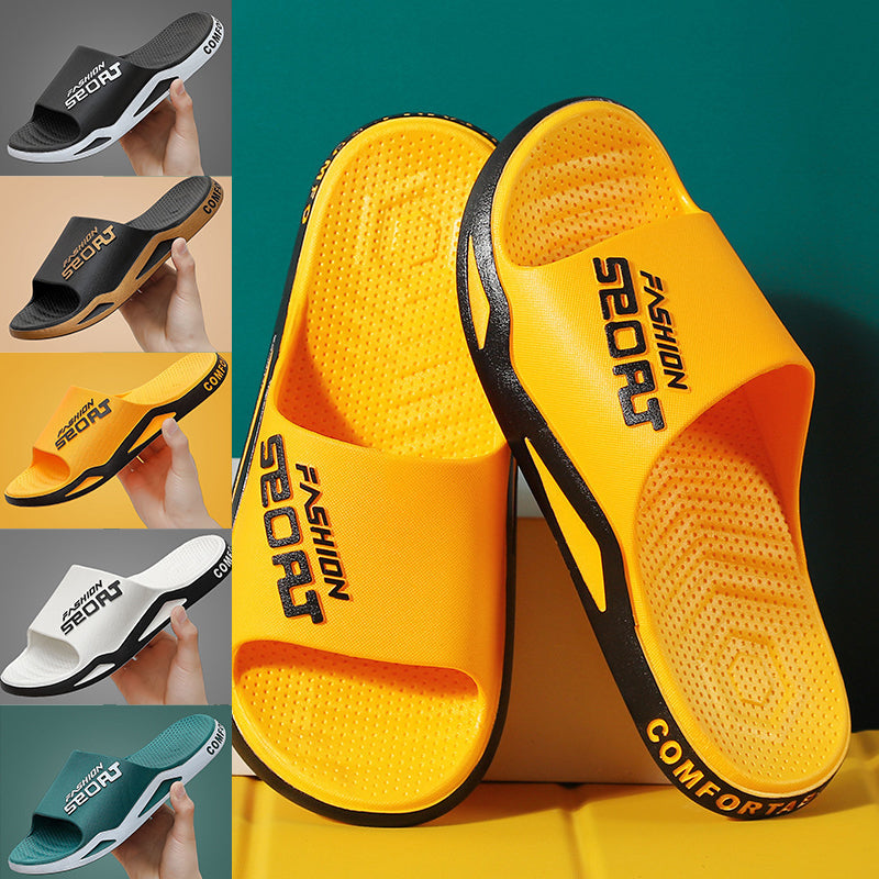 Top-down shot of men's sleek black sport slide sandals, ideal for pool shoes