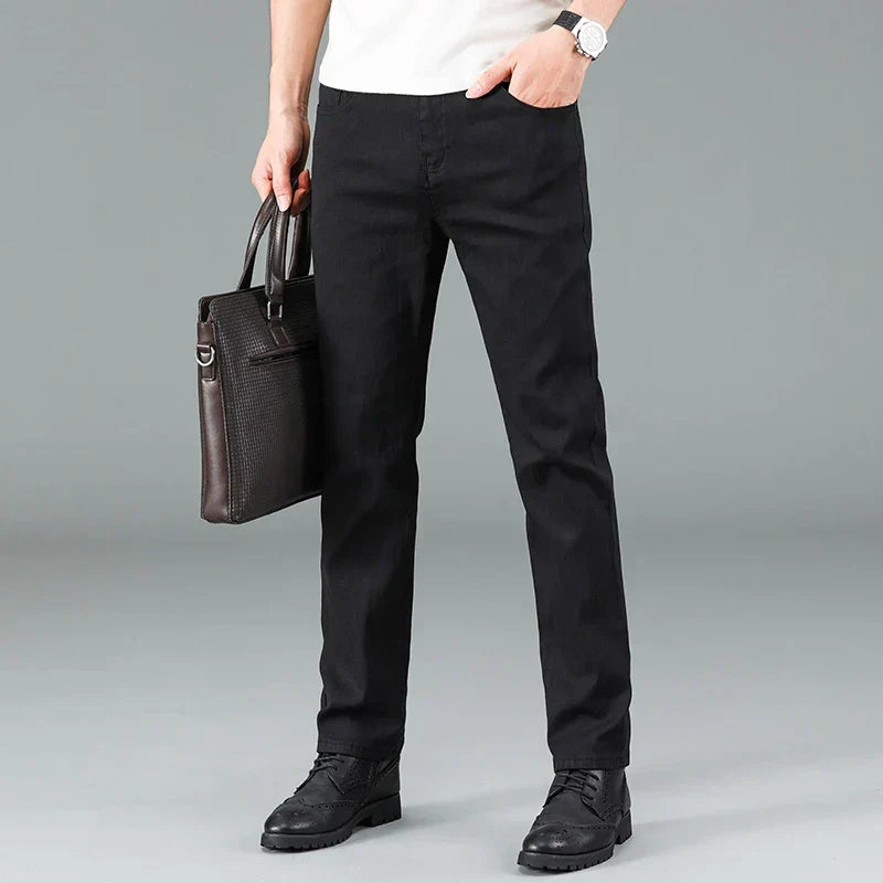 Men's black straight fit stretch jeans. Ideal for casual wear, offering ultimate comfort and a modern fit.