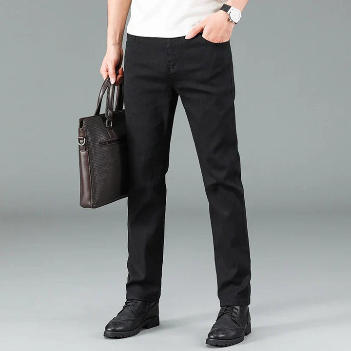 Men's black straight fit stretch jeans. Ideal for casual wear, offering ultimate comfort and a modern fit.