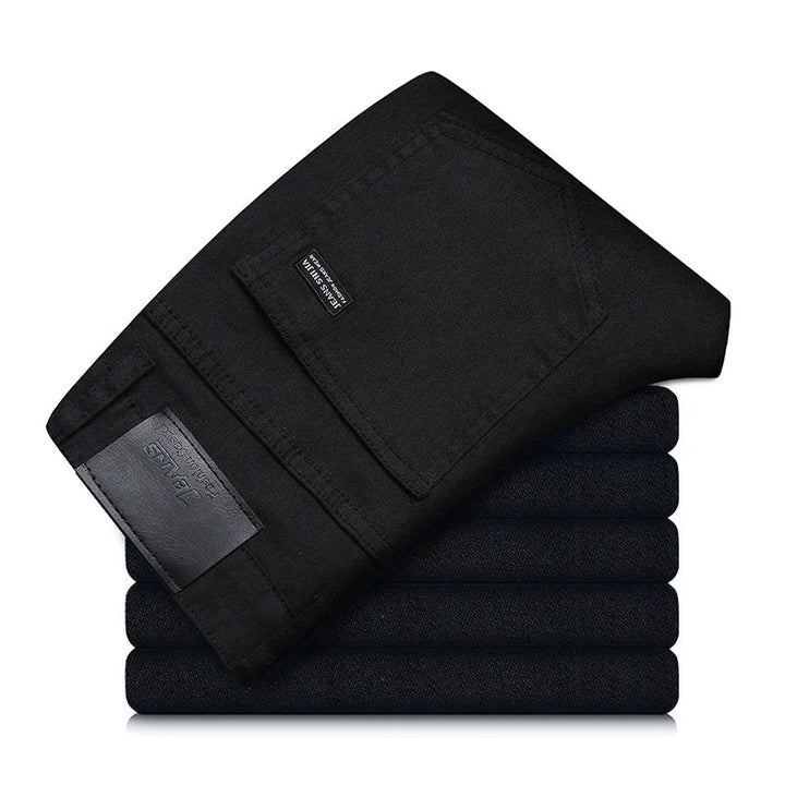 Stylish men's straight fit black jeans with stretch. Versatile pants perfect for everyday comfort and men's fashion.