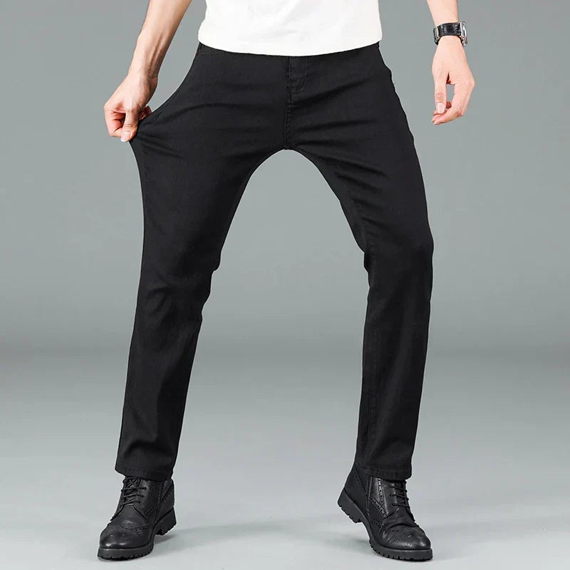 Comfortable men's straight fit black stretch jeans. Perfect for everyday wear, combining style and flexibility.