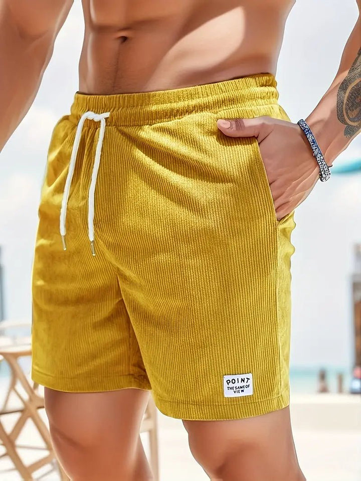 Fashionable men's quick-dry beach shorts, perfect for vacation & poolside adventures.