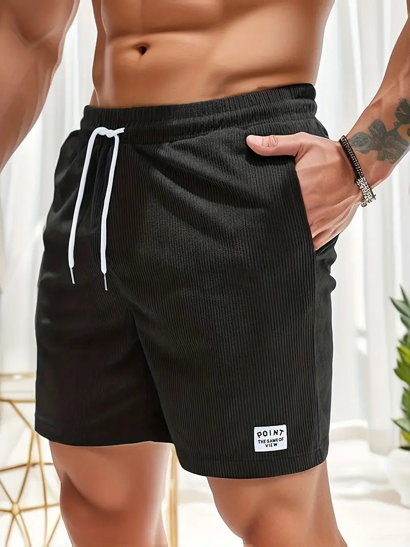 Printed men's quick-dry swim shorts, perfect for beach holidays & swimming.