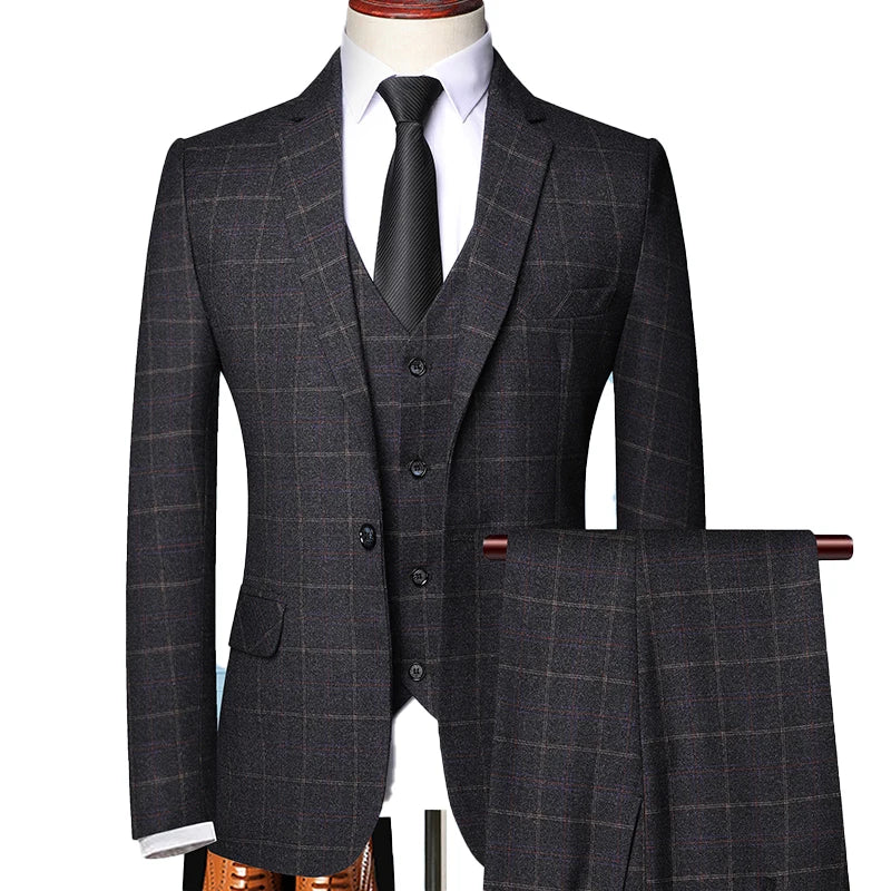 Stylish navy blue windowpane plaid men's suit, ideal for spring fashion and professional wear