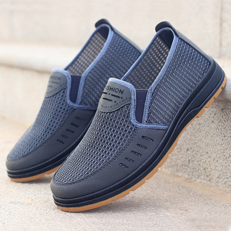 Stylish men's lightweight mesh sneakers for ultimate breathability and comfort. Ideal casual walking shoes.
