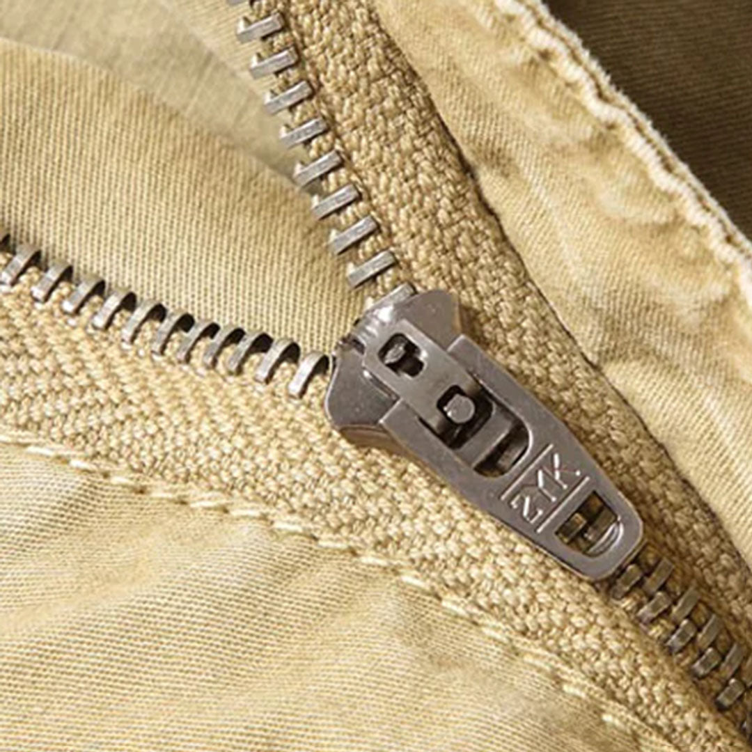 Side view of men's utility jogger pants, emphasizing the pocket placement and casual style.