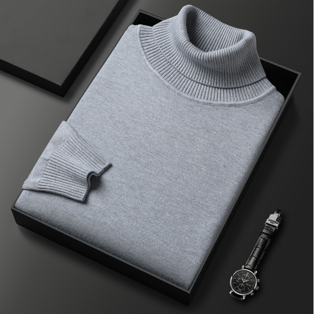 Model wearing a men's white turtleneck sweater, paired casually, an essential long sleeve for spring.