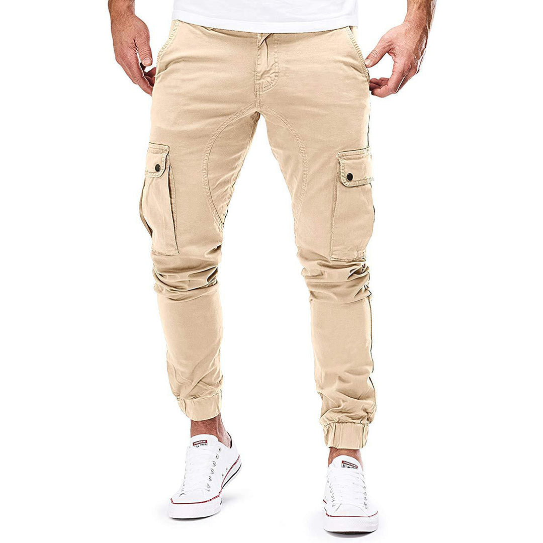 Close-up of the multi-pocket design on the leg of men's casual utility trousers, perfect for outdoor wear.