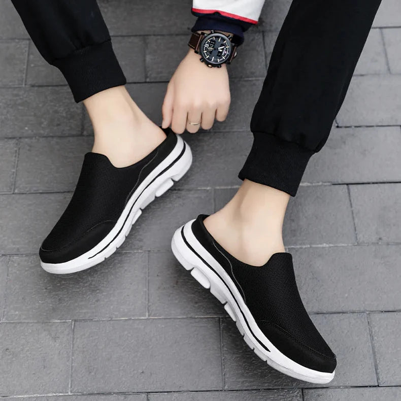 Summer-ready men's closed-toe mule sandals, a convenient slip-on style for casual everyday footwear.