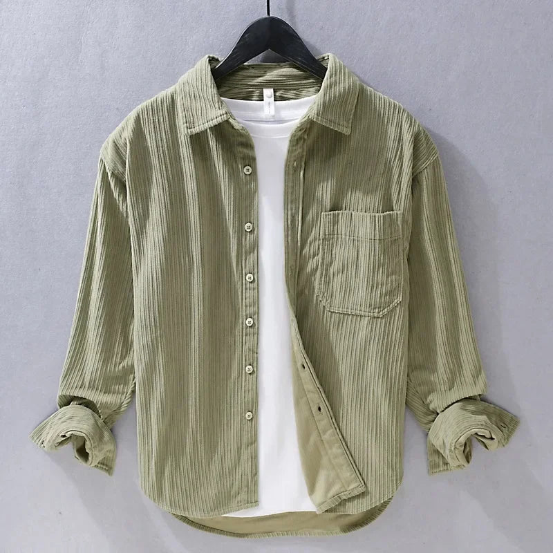 Stylish men's corduroy button-down shirt with long sleeves, great for versatile casual apparel