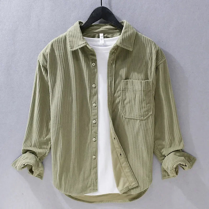 Stylish men's corduroy button-down shirt with long sleeves, great for versatile casual apparel