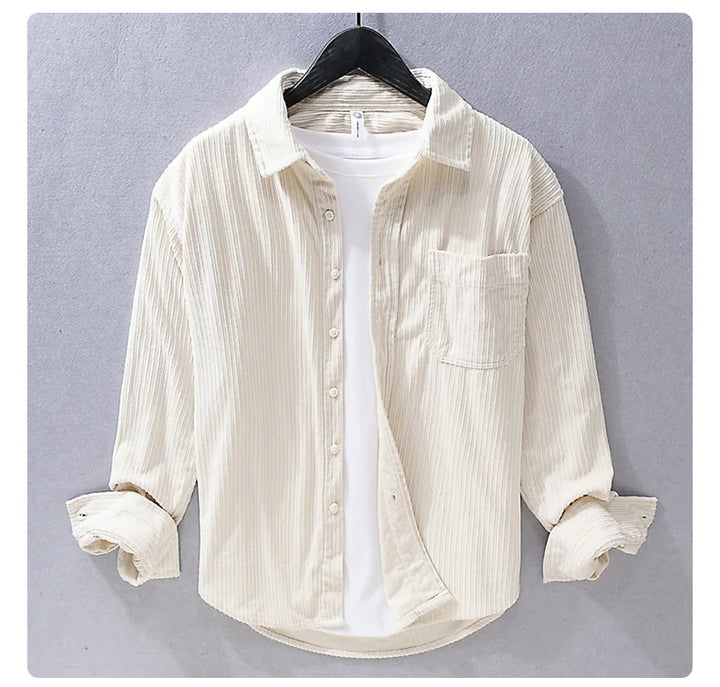 Model wearing a men's corduroy long sleeve button-down shirt, showcasing its casual appeal